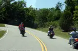 fast-motorcyclist-passing-slower-motorcycles.jpg