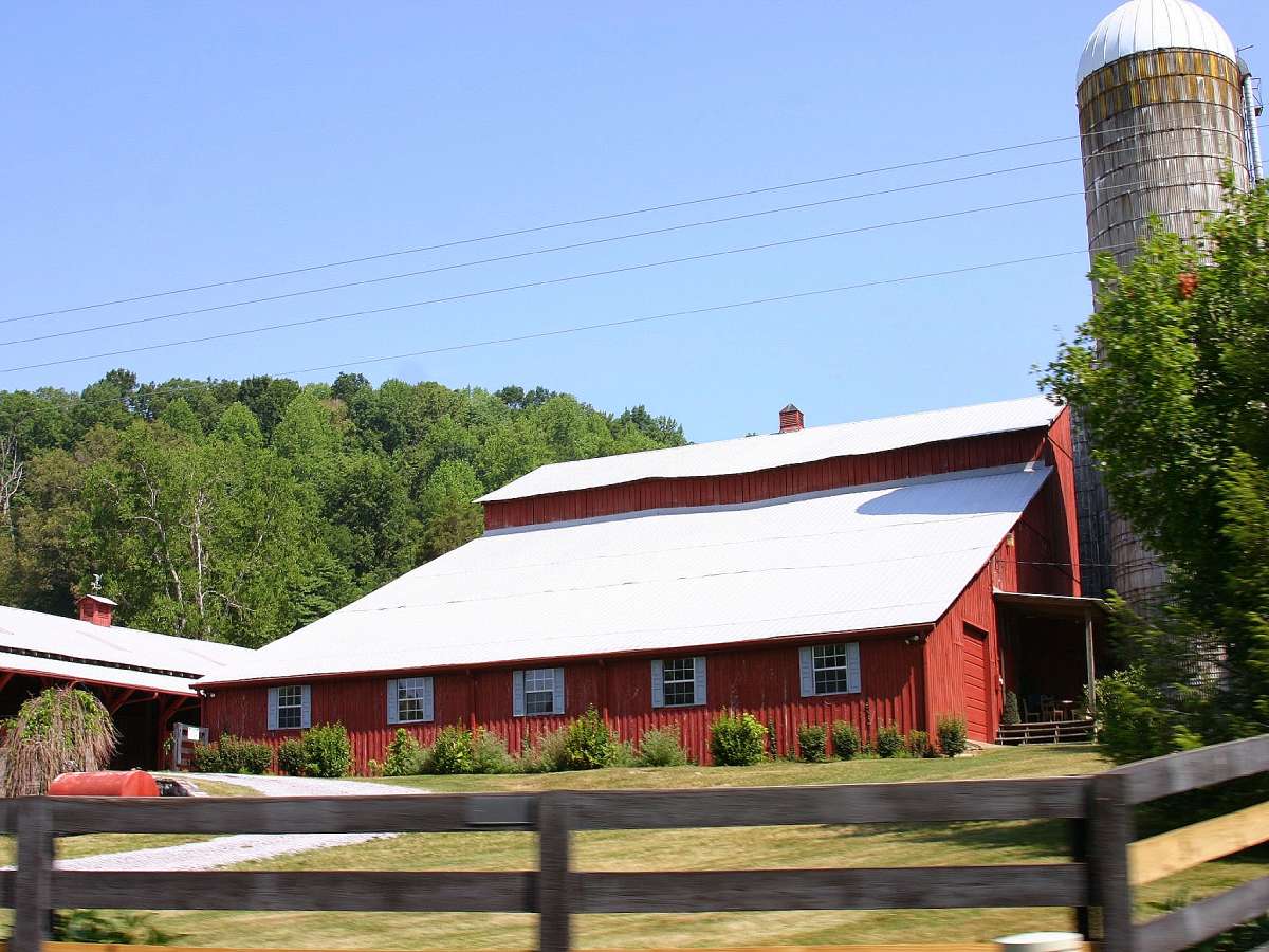 The Judd's family farm includes this iconic red barn and silo - both can be seen from the Natchez Trace Parkway in Nashville, Tennessee.